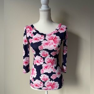 Beautiful scoop neck floral top with elegant low back detail